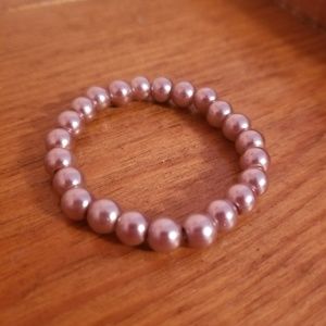 Handmade stretch bracelets.